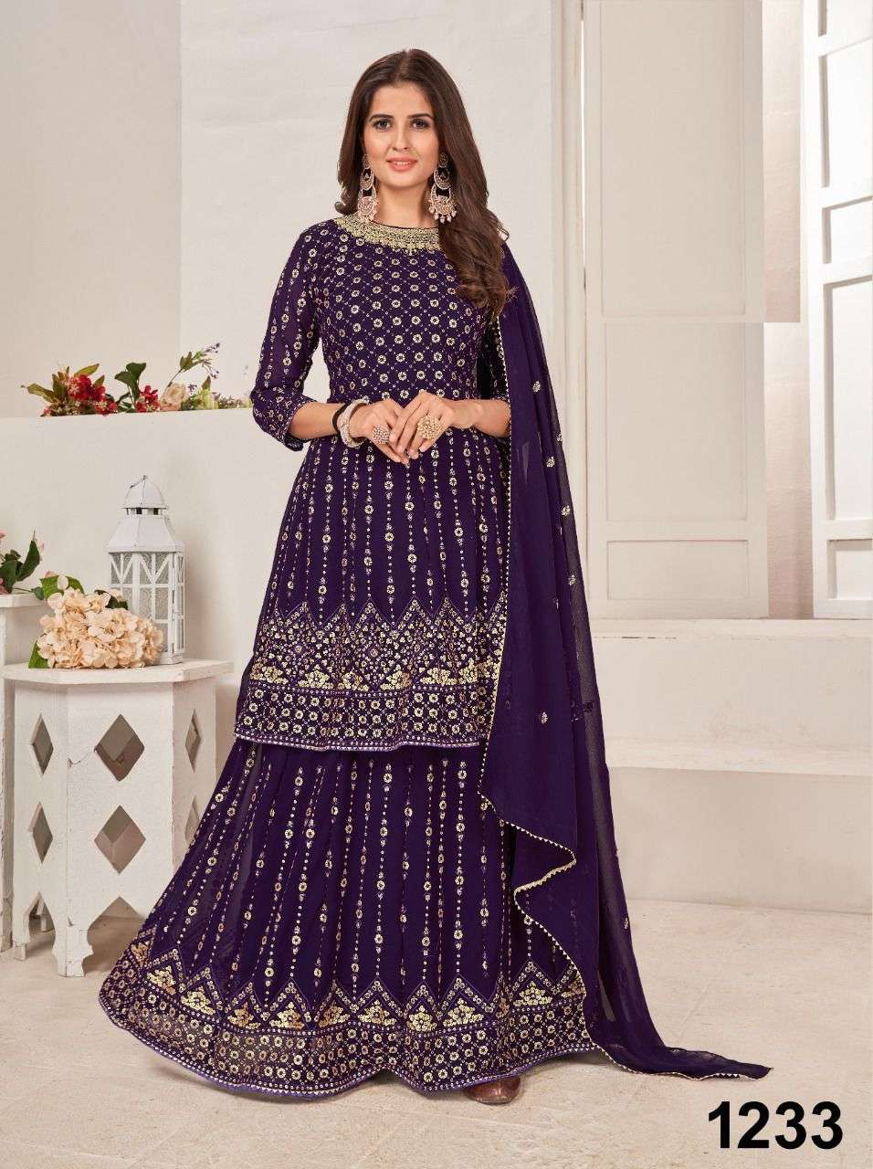 nazneen anika series 1233 to 1236 top and ghagra style bottom indian designer suit frock style bottom indian suit with plazo wholesaler of suits in surat