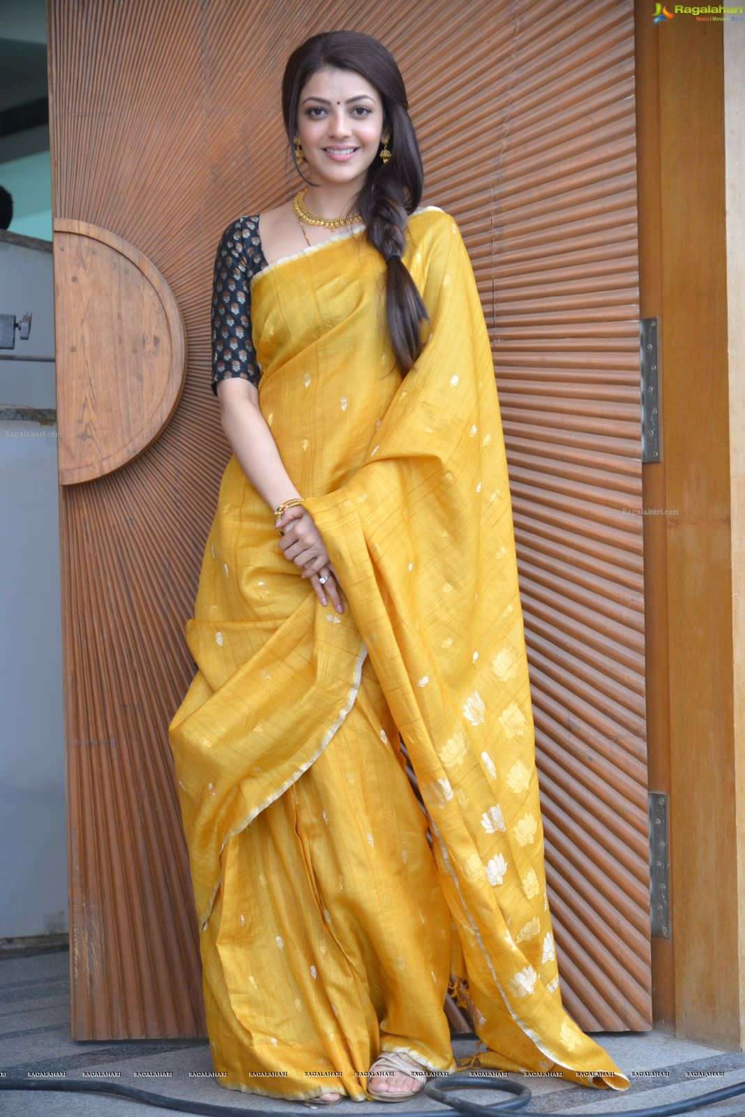 bollywood haldi and function special kajal agarawal saree soft lilan slab khadi attractive charmfull white with silver and gold weaving gold yellow function special saree  