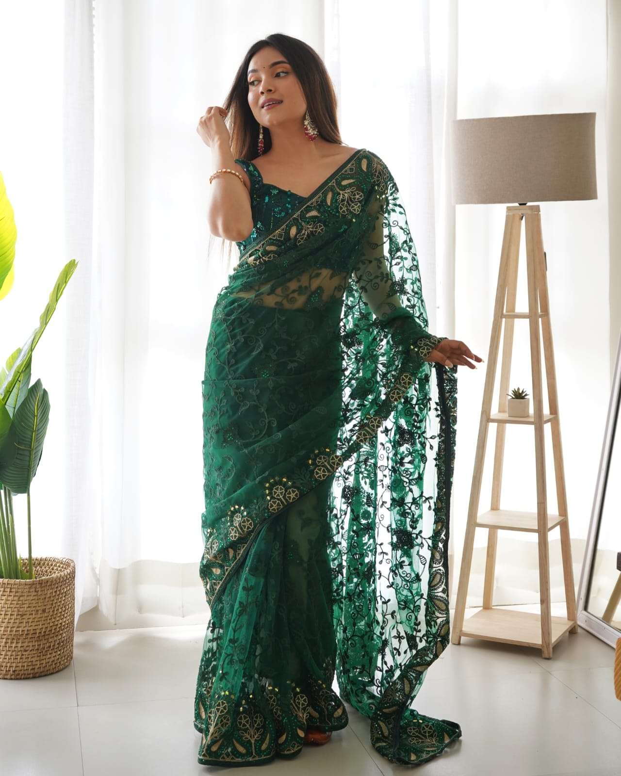 beautifull heavy embroidery net saree presenting a beautiful butterfly saree fabric heavy butterfly net work beautiful mullti colour thread and aari embroidery  