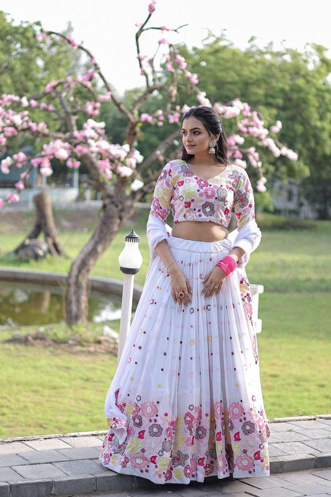 faux georgette designer lehenga choli ,beautified with embroidered sequins and thread work all white colour designer lehenga  