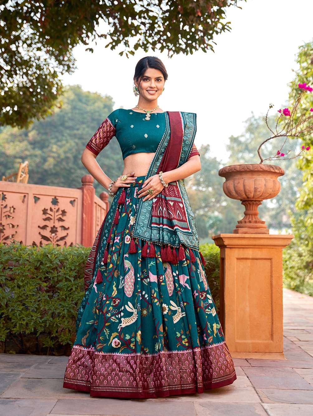 1202tel 1202grn 1202mst 1202mrn lehenga choli embrace the elegance of dola silk where tradition meets contemporary style in every printed lehenga choli 