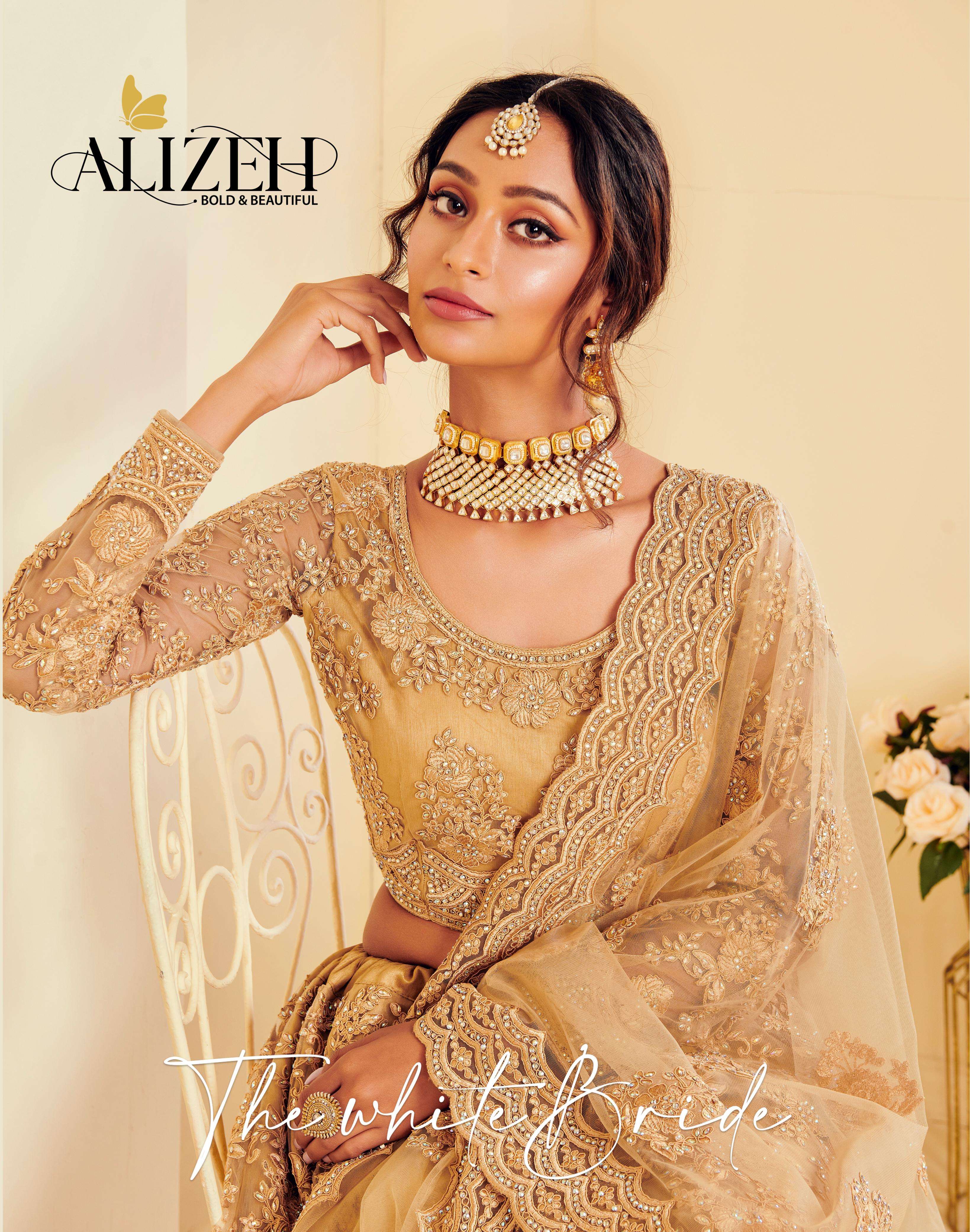 alizeh official catalogue the white bride series 1001 to 1004 classic golden n off white colour collection to rock weddings this season product weight is 3 kg bridal heavy lehenga 