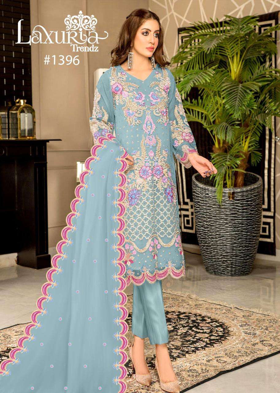 laxuria trendz new design launch design number 1396 a sophisticated yet elegant on  liac pink n turquoise blue shade enhanced with intricate long shirt embroidered front n floral decorated