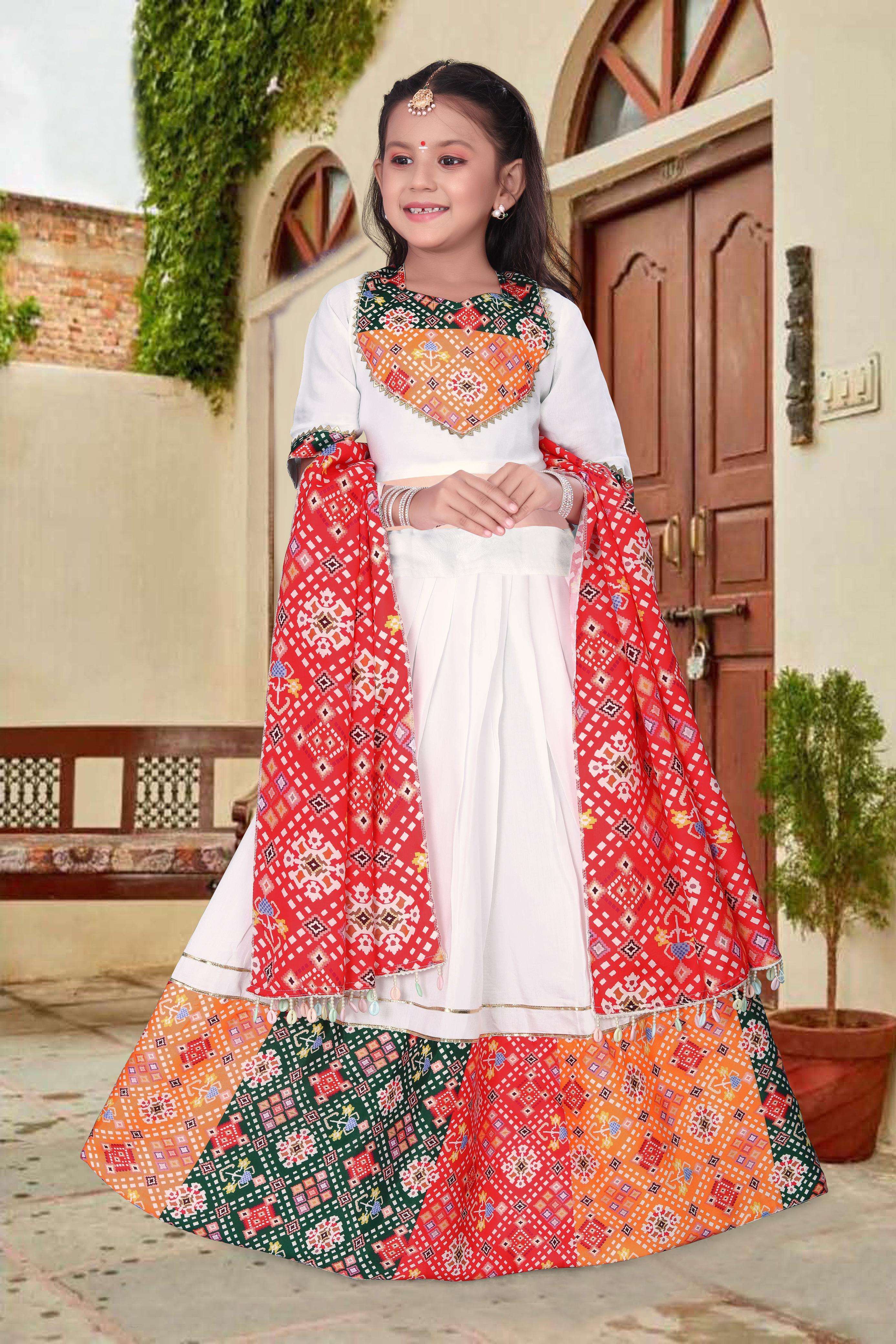 kids wear lehenga navratri collections 2024 lehenga choli love navratri 2024 code oc 176 choli fabric heavy pv chanderi with soft printed work with heavy lace with latkan dori