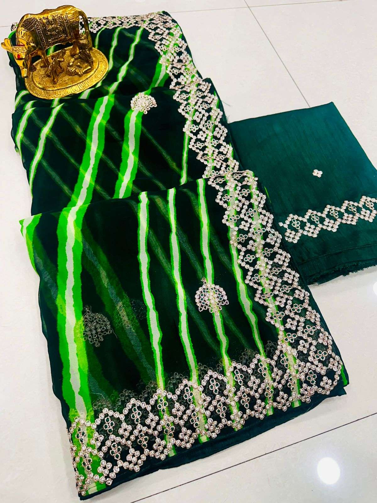 madhuri saree pure georgette saree with beautiful unique  leheriya print n heavy c pallu thread zari work border n all over butti in saree designer partywear saree 