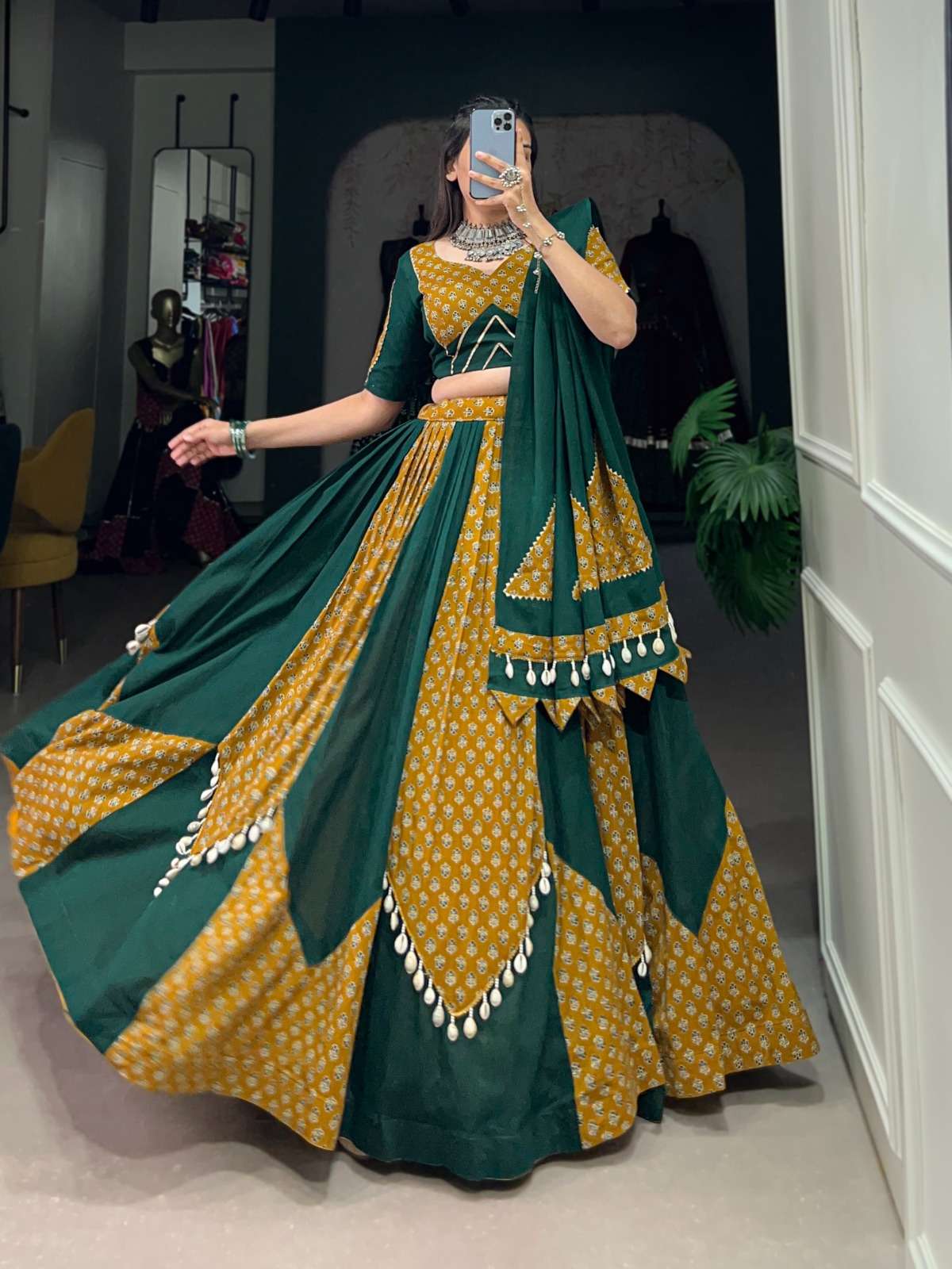 navratri collection 2024 step into the festive season with a mustard n green cotton chaniya choli plain with printed kali and beautiful cowrie kodi wor lehenga 