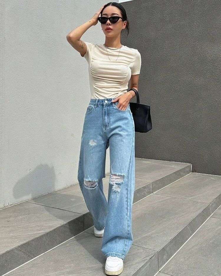 womens wear jeans bottom wear womans wide leg ripped jeans pattern wide leg ripped jeans fabric denim non strechable colours 1 light blue size 26 to 40