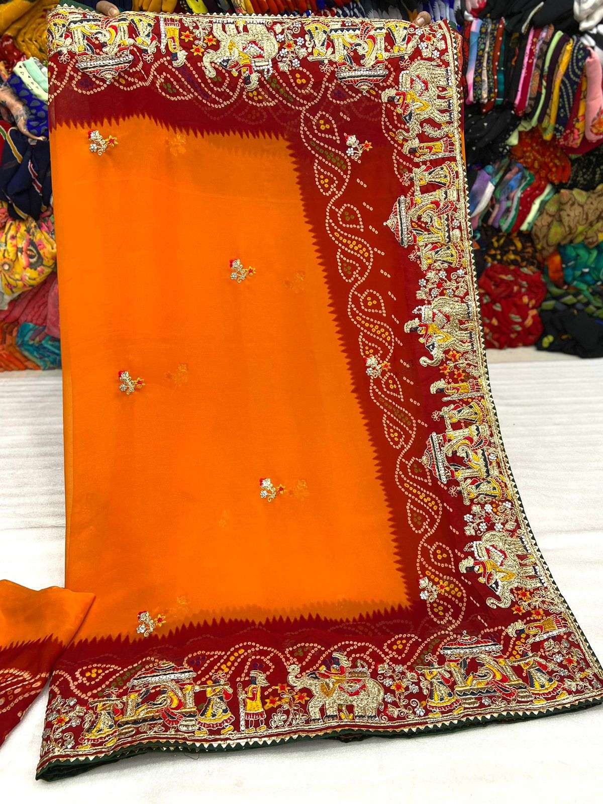 Orange and Green Bandhani Saree with Zari border